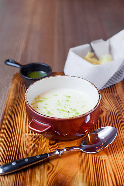 istock Potato cream-soup with chips and Basil pesto 533855468