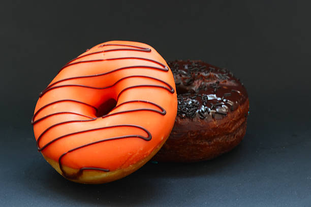 istock Donuts. Glazed donuts with icing. Homemade donuts. Donuts background. 533856156