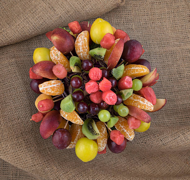 Fruits basket on sackcloth background