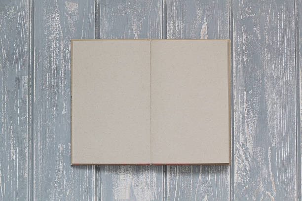 istock Note book on grey wooden desk. 533862022