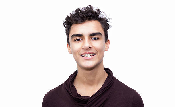 istock Portrait of smiling young man over white background 533863892