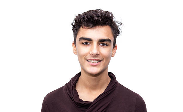 istock Portrait of smiling young man over white background 533864032