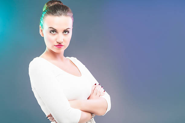 istock Serious Sensual Brunette Woman Over Gray Background. Horizontal Image Composition 533886721