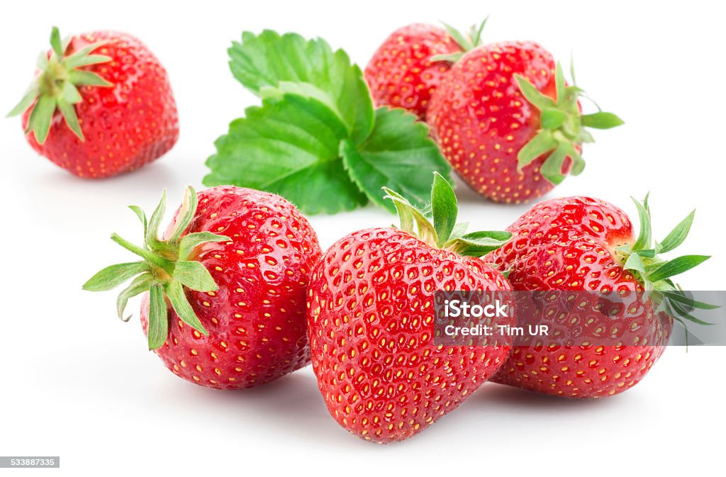 Strawberries with leaves. Isolated on a white background. 2015 Stock Photo