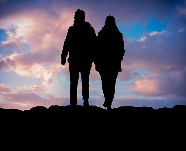 istock Hiking Couple At Sunset 533887697