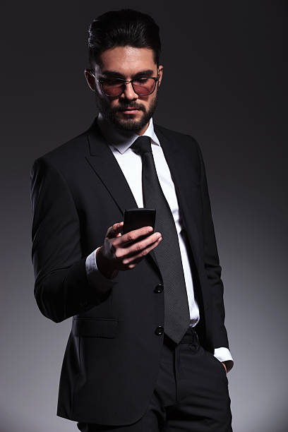 istock young business man texting on his smartphone 533889137