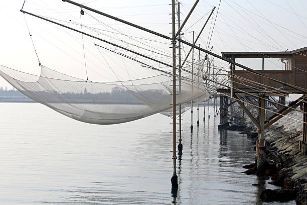 istock fishing nets over the pile dwellings 533889609