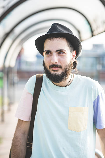 istock young handsome hipster gay modern man 533892769