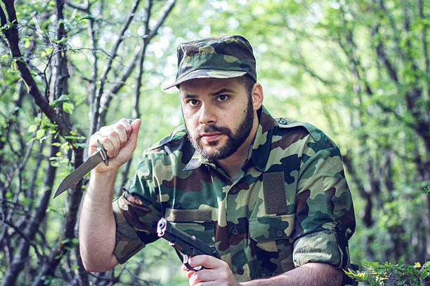 istock Soldier lurking with knife 533896062