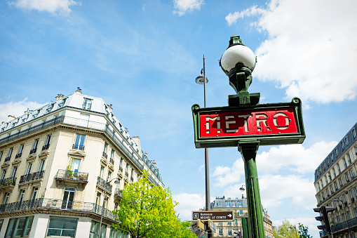 Metro sign for subway in Paris, France. Shot taken on Arts et Metiers square