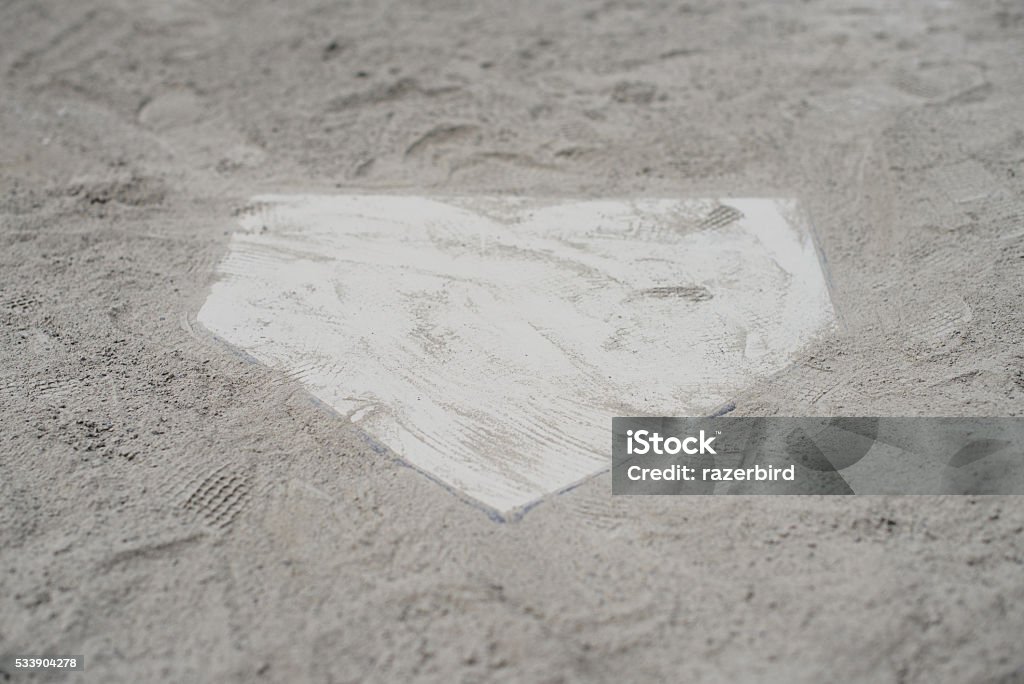 White home plate set in sand American Culture Stock Photo