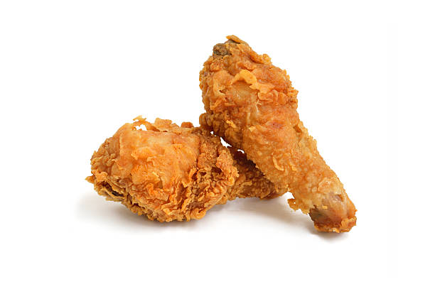 istock Two pieces of  fried chicken Drumstick on white background 533904458