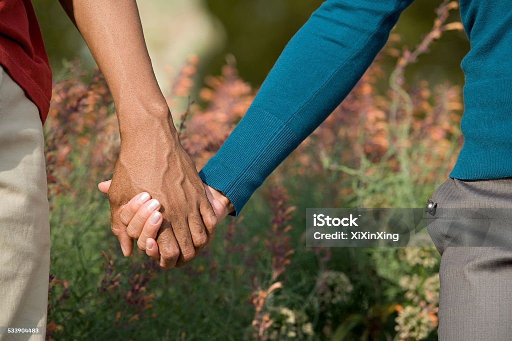 Couple holding hands Indigenous Peoples of the Americas Stock Photo
