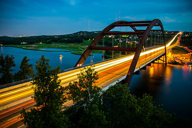 istock One Moment in time Pennybacker loop 360 Bridge at night 533905249