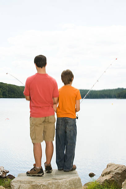 istock Father and son fishing 533906165