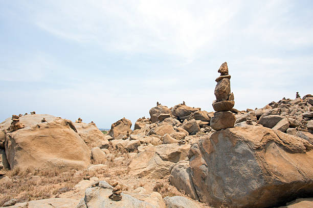 istock Stone pebbles stacked on the rocks on the beach Aruba 533907872