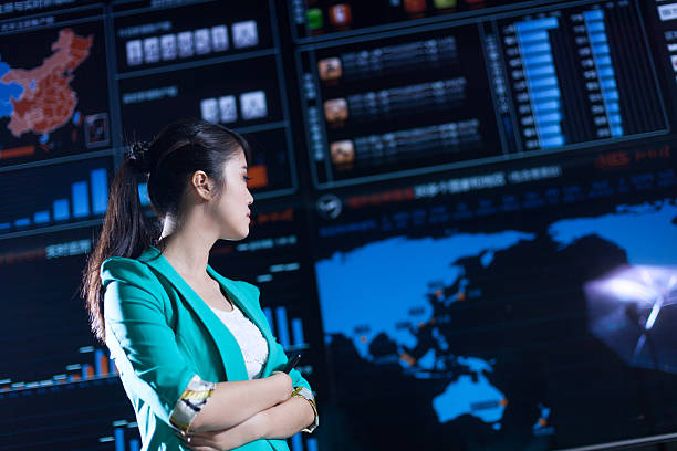 istock Asian successful office lady portrait with digital chart graph background 533909801