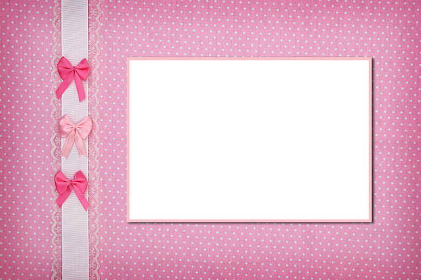 istock Photo frame on pink polka dot background 533910459