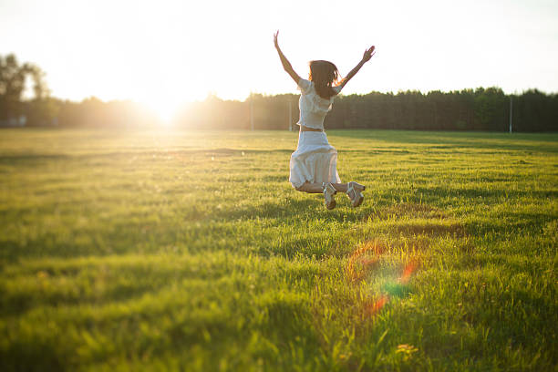 istock Beautiful girl walking on the field 533910543