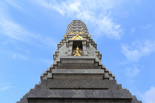 stupa with blue sky in background