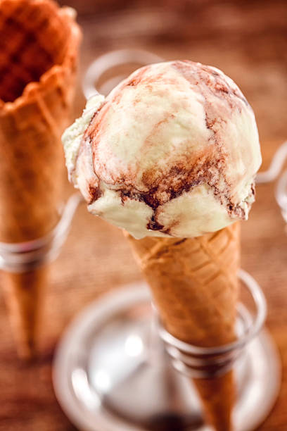 istock Pistachio Chocolate Ice Cream in a Cone 533912134