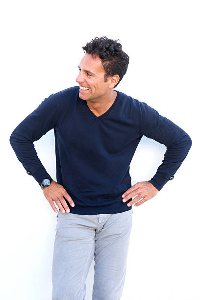 istock Laughing middle aged man standing against white background 533915142