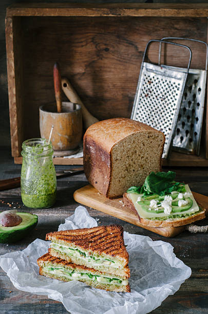 istock Healthy sandwich with cheese, pesto, avocado and spinach 533916300