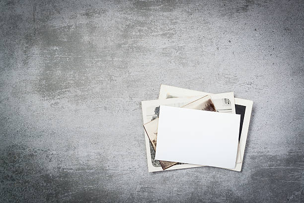 Old vintage photos on concrete background