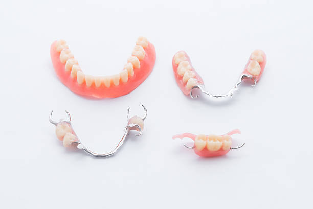 istock Set of dentures on white background 533922394