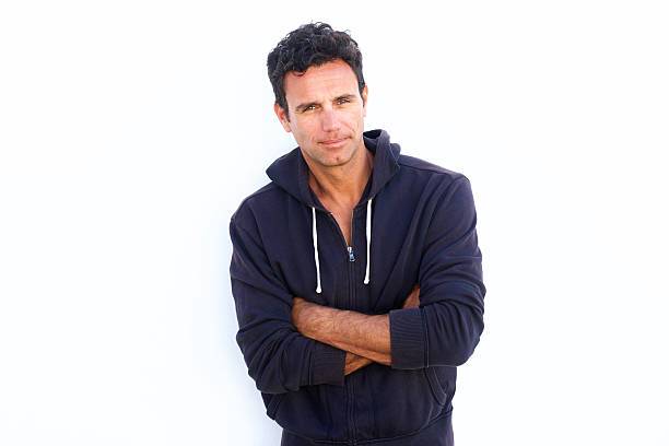 istock Rugged handsome middle aged man standing with arms crossed 533922778