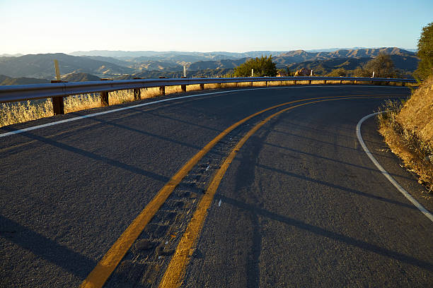 istock Road through the hills in Malibu at sunset 533923076