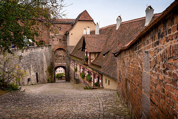 Nuremberg Castle Nuremberg, German - October 30, 2014: In 1944-45, during World War II the Nuermberg Burg sustained heavy damage from allied bombings.  Today the castle has been completely restored to it's original designs of the 1100's. kaiserburg castle stock pictures, royalty-free photos & images