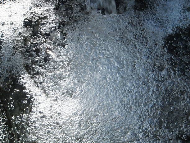 istock Air bubbles in splashing water 533936293