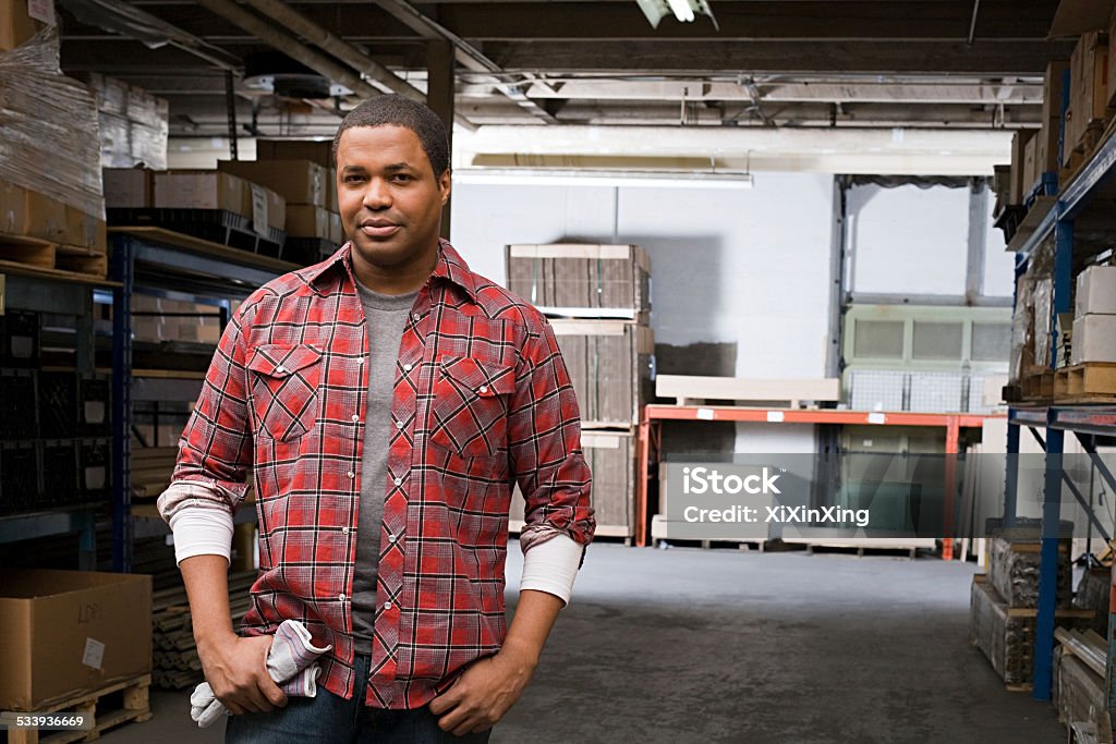 Man in warehouse Blue-collar Worker Stock Photo
