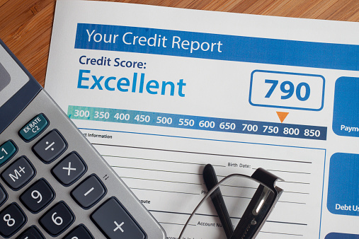 Credit report with score on a desk