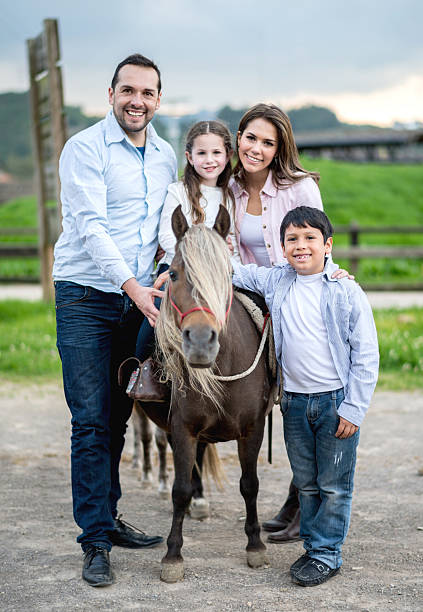 istock Family with a pony 533939101