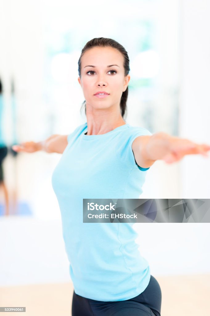 Young Woman Yogi Practicing Yoga in Studio Young Woman Yogi Practicing Yoga in Studio  20-29 Years Stock Photo