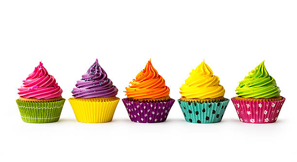 bunte cupcakes - sprinkles isolated white multi colored stock-fotos und bilder