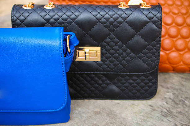 istock colored handbags closeup 533959323
