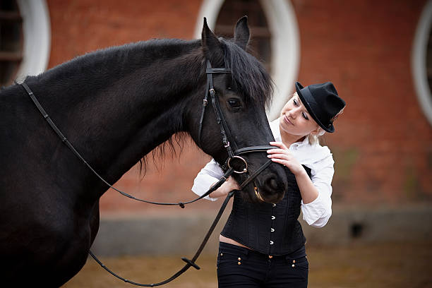istock Girl and horse 533960413