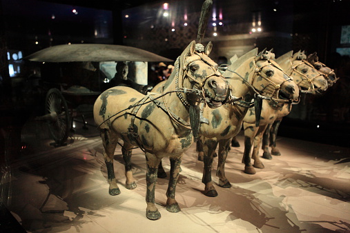 Vienna, Austria - August 16, 2023: A horse carriage carries tourist in a street in Vienna.
