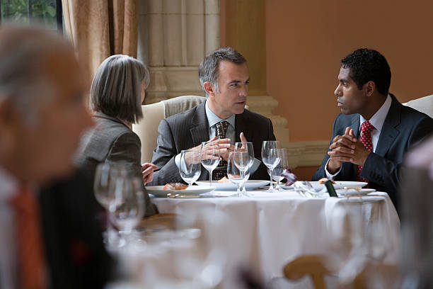 istock Businesspeople Talking At Restaurant Table 533961305