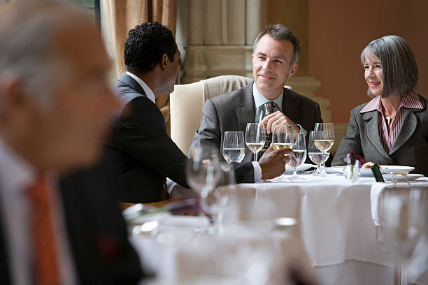 istock Businesspeople Talking At Restaurant Table 533961317