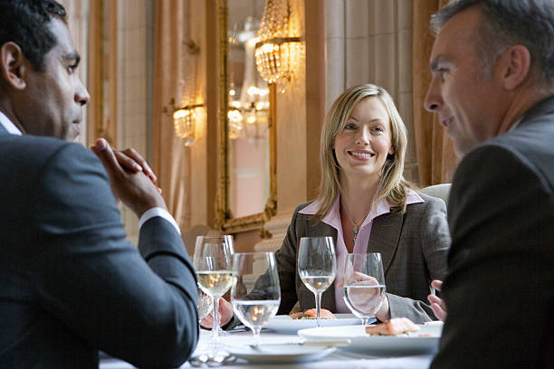 istock Businesspeople Talking At Restaurant Table 533961351