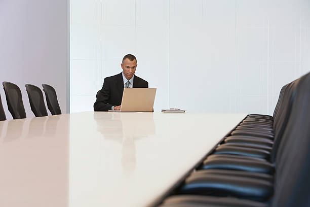 istock Businessman Using Laptop In Board Room 533963601