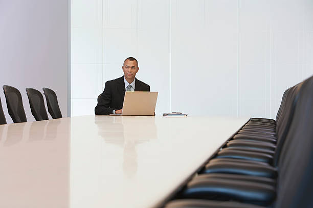 istock Businessman With Laptop In Board Room 533963609