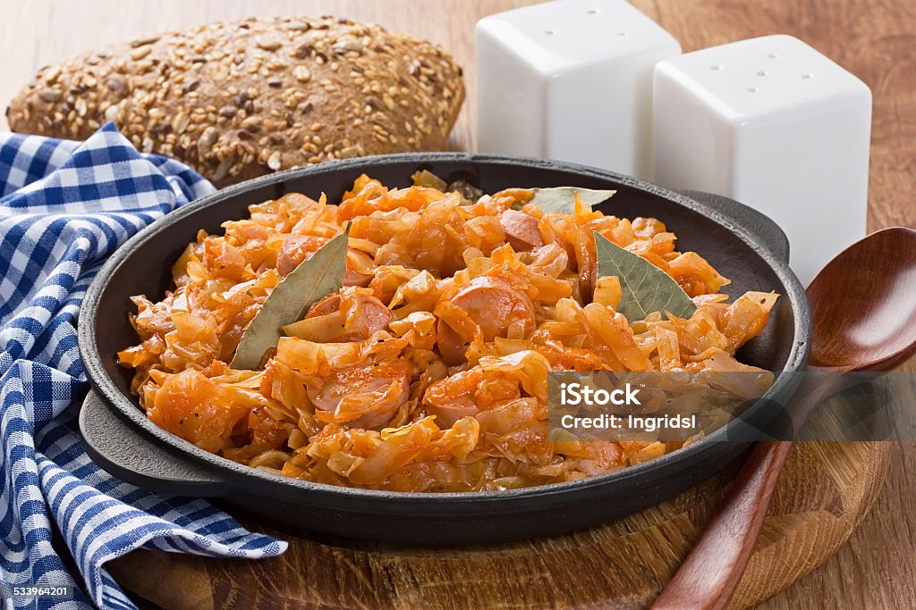Braised cabbage Braised cabbage with sausage, carrot and tomato sauce 2015 Stock Photo