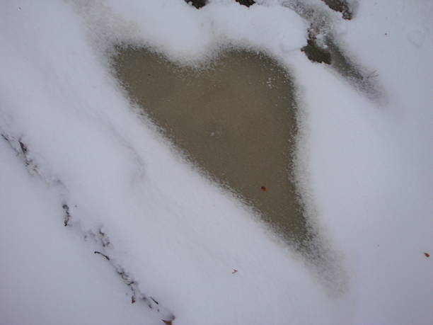 istock Heart shape in the snow 533964253