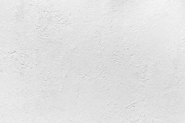 Photo of White concrete wall with plaster. Background texture