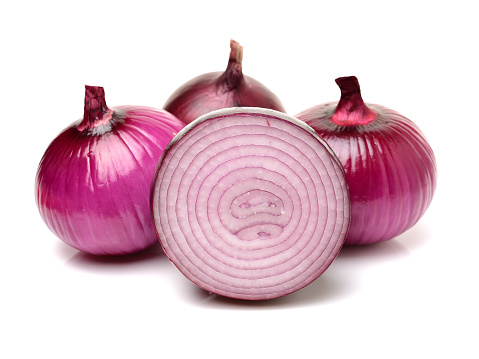 Red onion over white background